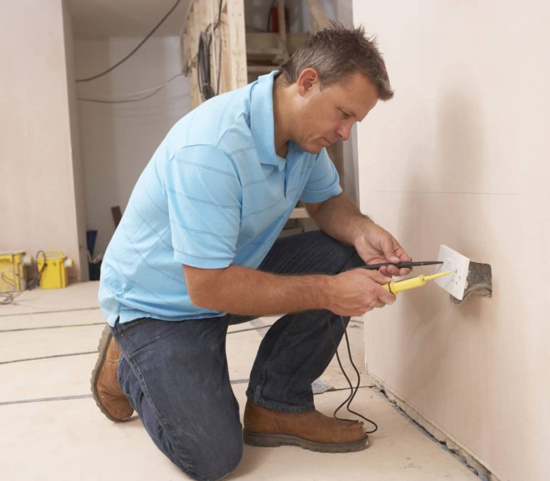 Electrician Installing Wall Socket Electrician Installing Wall Socket